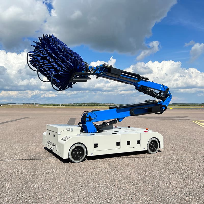 Aerowash AW3+ — telescopic articulating blue arm extended in hangar